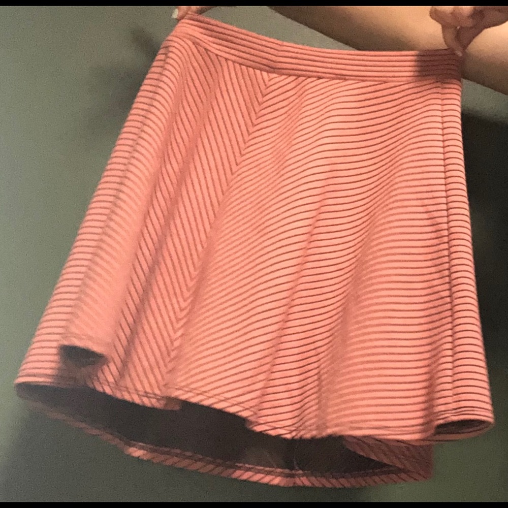 Pink and black striped skirt